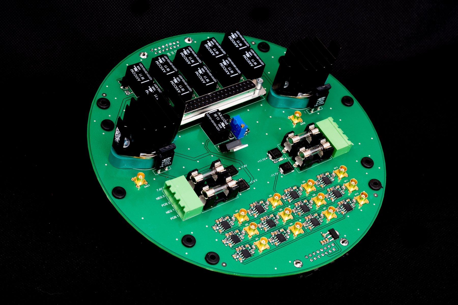 Populated circular power amplifier PCB at an angle